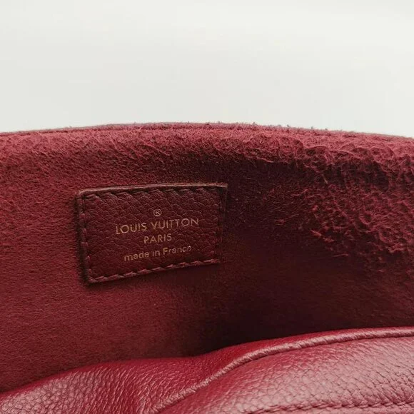 Louis Vuitton ALMA Handbag in Monogram Coated Canvas Brown Contrast Burgundy - Picture 9 of 11